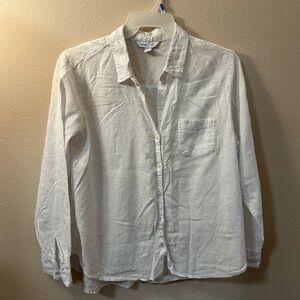 White Women’s Shirt with floral embroidery all over it